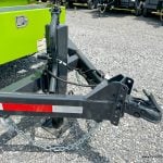 Close-up of the trailer's adjustable 2 5/16" coupler, ensuring compatibility with various towing vehicles