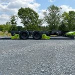 Side view of 22' FlatTrak completely flat on the ground lime green and gray FlatTrack